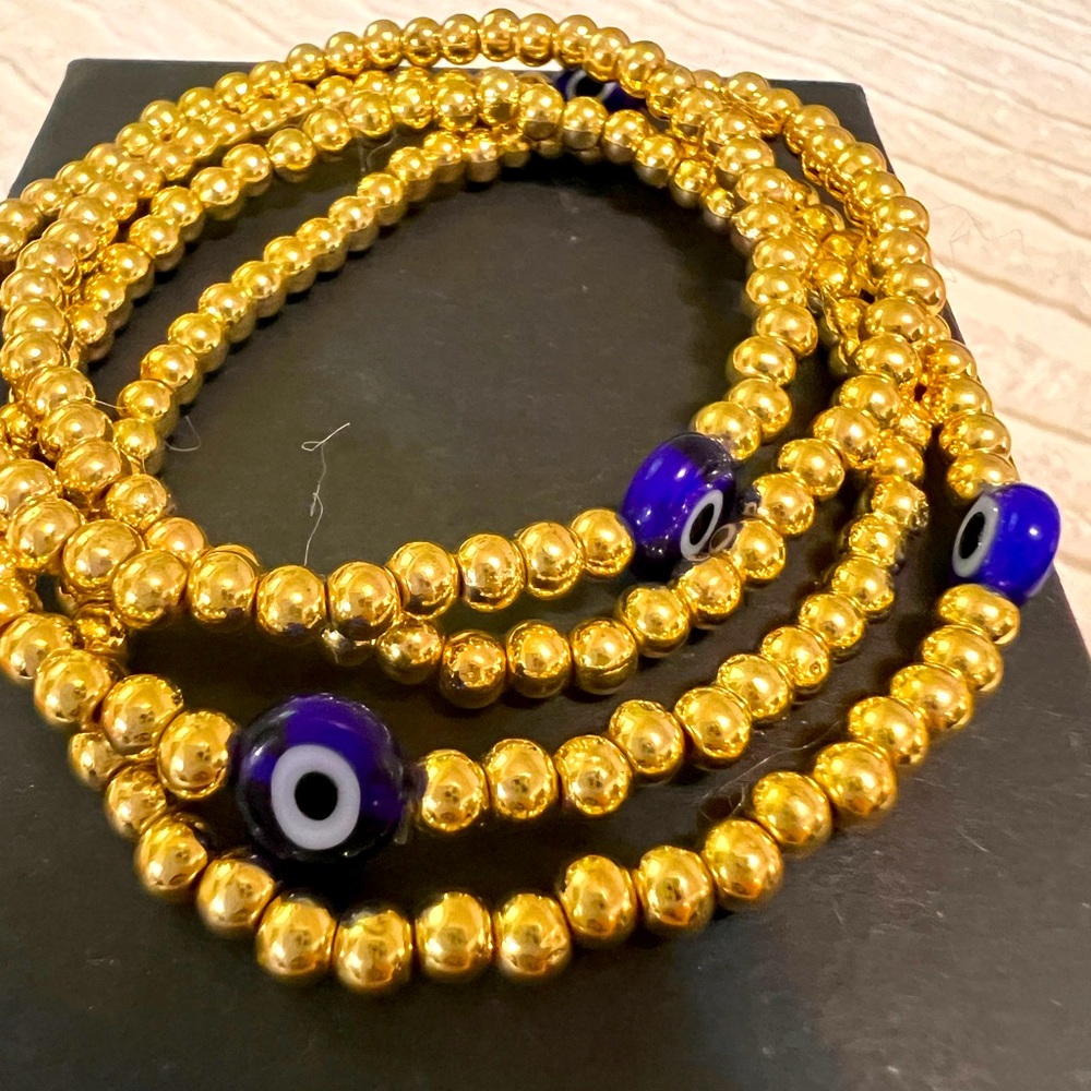 Set of 4 Gold Tone Evil eye 🧿 elastic Bracelet